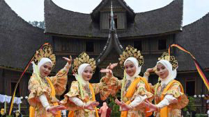 Indonesian dancers in Minangkabau traditional outfits participate at