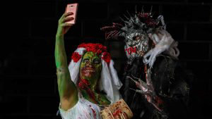 Revellers take part in the annual Zombie Walk in Sao Paulo