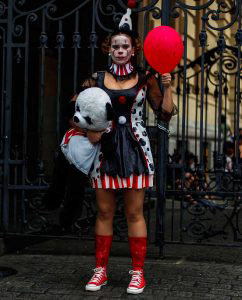 A reveller poses for a picture during the annual Zombie Walk in Sao P