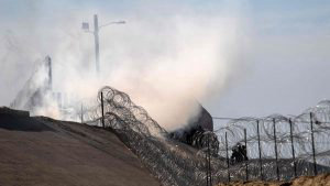 Tear gas thrown by the US Border Patrol to disperse Central American