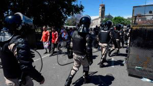 Security forces stand guard as River Plate's supporters leave the Mon