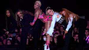 Trinidadian-US rapper Nicki Minaj (C) performs with British group Lit