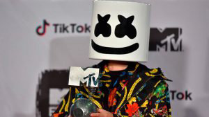 US DJ-producer Marshmello poses backstage after winning the Best Elec