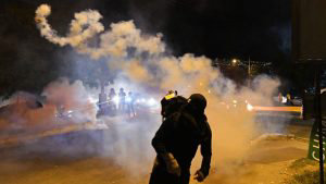 TOPSHOT - Soldiers of the presidential guard shoot tear gas at suppor