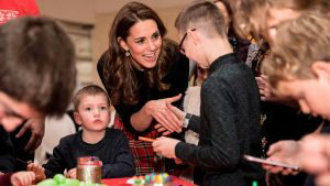 Britain's Catherine, Duchess of Cambridge (C), meets children at a Ch