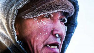 RUSSIA-WEATHER-COLD-ICE-HARVESTING