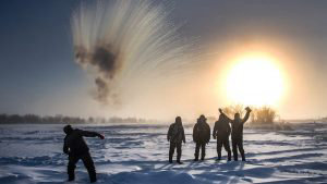 RUSSIA-WEATHER-COLD-ICE-HARVESTING
