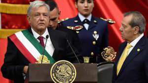 Mexico's new President Andres Manuel Lopez Obrador gets ready to deli