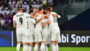 Real Madrid players celebrate their opening goal during the Final mat