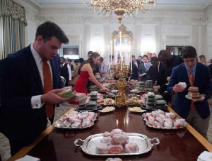 Guests select fast food that the US president purchased for a ceremon