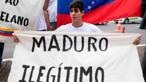 Venezuelans living in Brazil take part in a protest against Venezuela