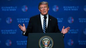 US President Donald Trump speaks during a press conference following