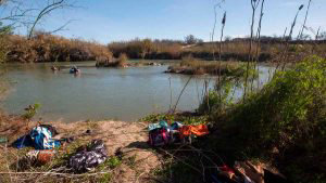 Belongings of Central American migrants trying to cross the Rio Bravo