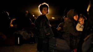 TOPSHOT - Women and children evacuated from the Islamic State (IS) gr