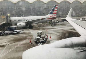 Snow falls at Ronald Reagan Washington National Airport on February 2