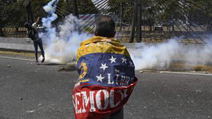 Opposition demonstrators clash with soldiers loyal to Venezuelan Pres