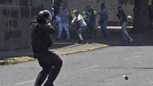 A National Bolivarian Police officer loyal to Venezuelan President Ni