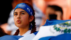 An El Salvador fan watches the CONCACAF Gold Cup Group C match betwee