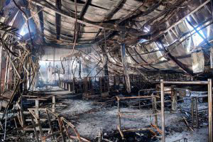 View of a supermarket after been burned and looted during mass protes