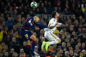Barcelona's Spanish defender Jordi Alba (L) and Real Madrid's Spanish