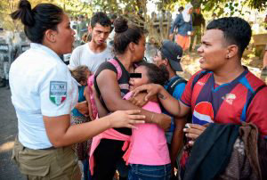 A Central American migrant family - heading in a caravan to the US -