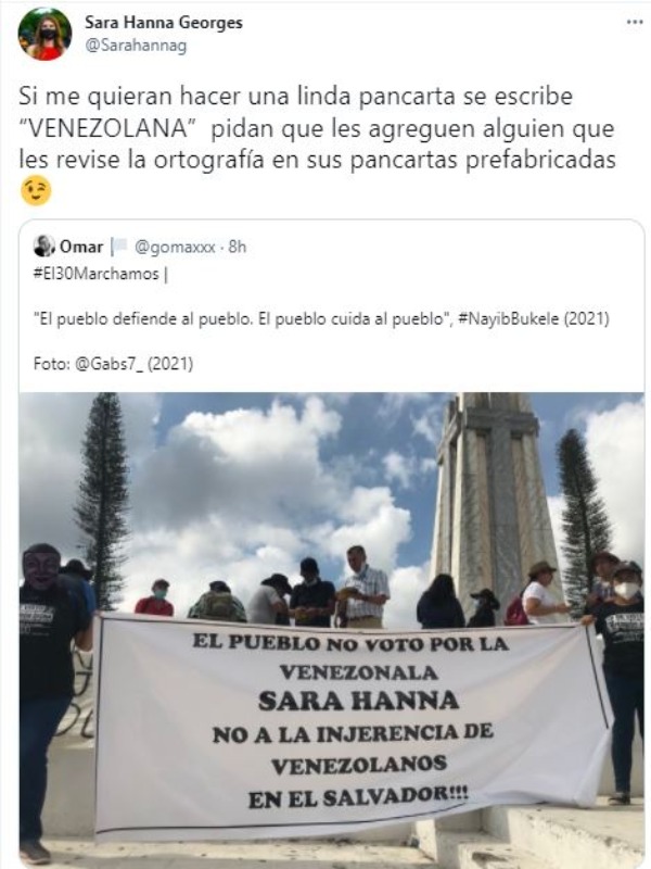 sara-hanna-asesora-venezolana-de-bukele-reacciona-ante-pancarta-e
