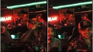 ¡Botella tras botella! Christian Nodal captado en estado de ebriedad, indigna por usar de copa un premio Grammy