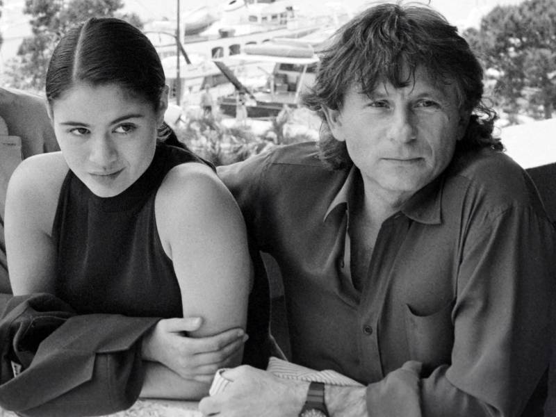 Charlotte Lewis y Roman Polanski en Cannes en 1986