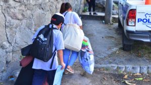 Migrantes que fueron deportados desde Estados Unidos llegan a El Salvador a la Gerencia de Atencion al Migrante.