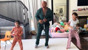 The rock dance with his daughters
