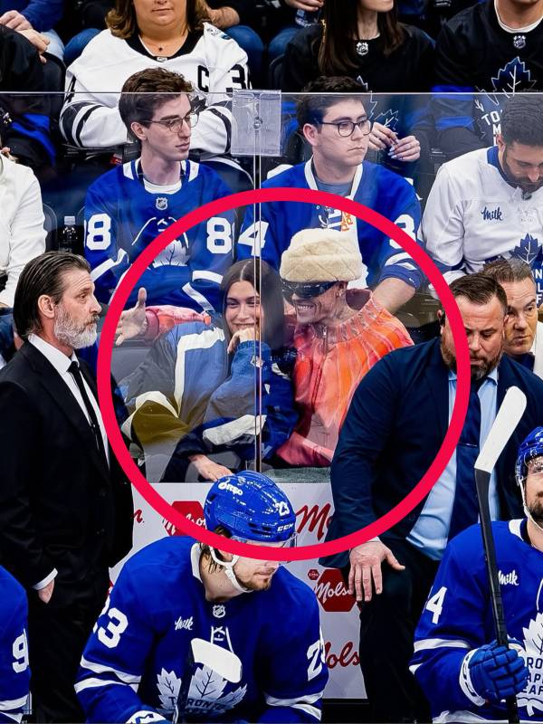 Justin Bieber y su esposa en juego de hockey