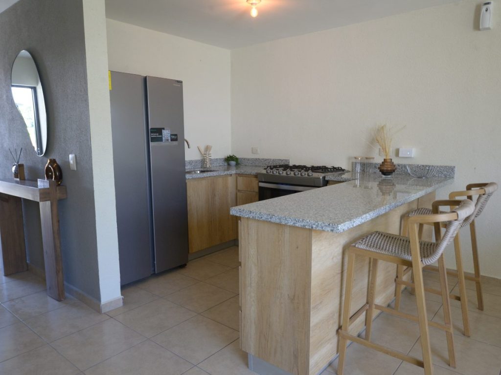 Modelo Jazmín: casa de dos plantas con 100 m², ideal para familias en crecimiento que buscan amplitud y funcionalidad.