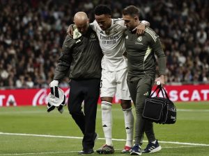 Real Madrid's Éder Militao leaves the pitch after getting injured during the LaLiga EA Sports game between Real Madrid and Celta de Vigo at Santiago Bernabeu Stadium, in Madrid, Spain, 7 December 2025.