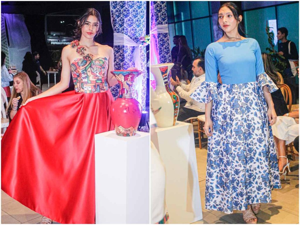 A la izquierda, modelo luce un diseño en rojo vibrante con top artístico inspirado en la obra de Fernando Llort; a la derecha, un vestido en tonos celestes con estampado de Escuela de Pájaros.