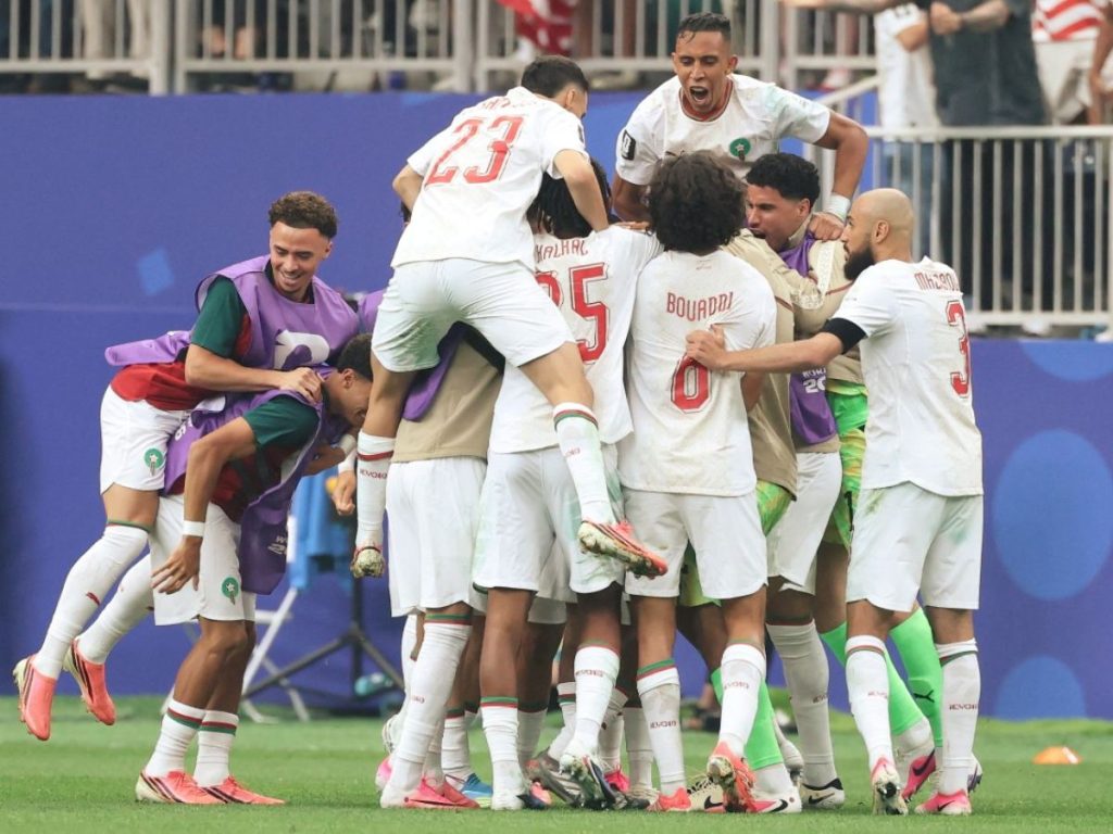Marruecos celebra su clasificación a cuartos de final al eliminar a Canadá. Foto AFP