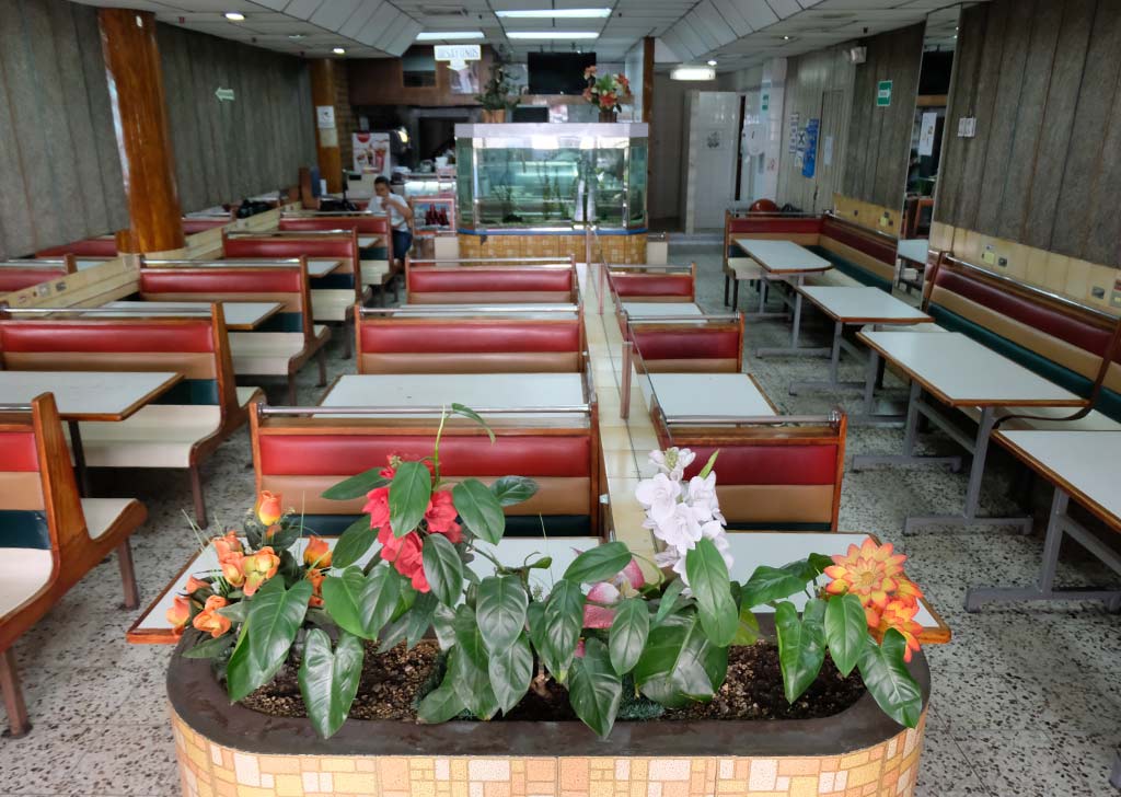 Uno de los detalles más recordados de Mía Pizza es su particular sistema de luces para solicitar la atención del personal.